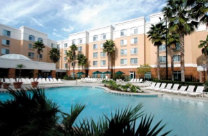 Heated indoor/outdoor pool - Courtyard Orlando in the Marriott Village