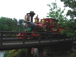 Western River Railroad passing over the trestle above the outdoor dining area.
