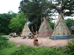 Indian village scene visible from Western River Railroad.